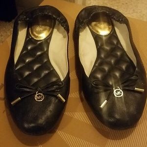 Mk black flats